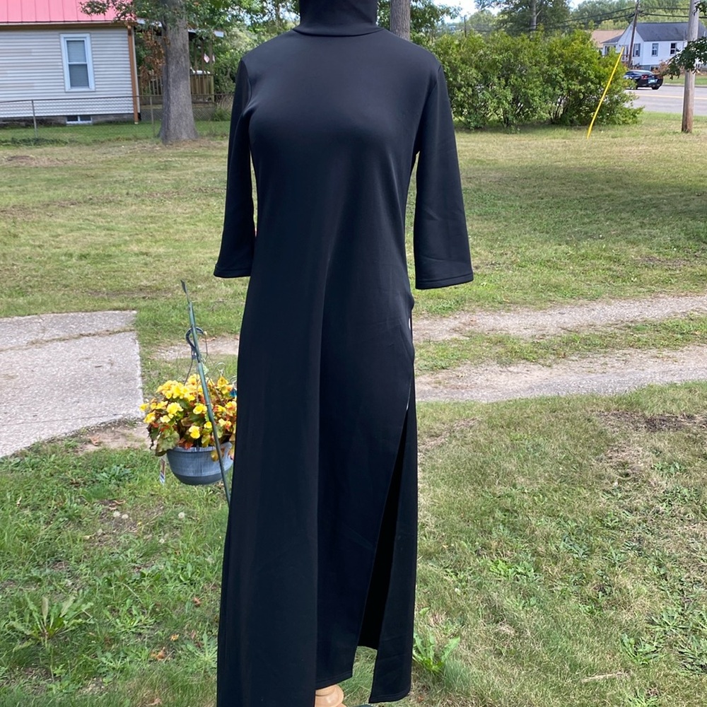Black maxi turtleneck with high side slit